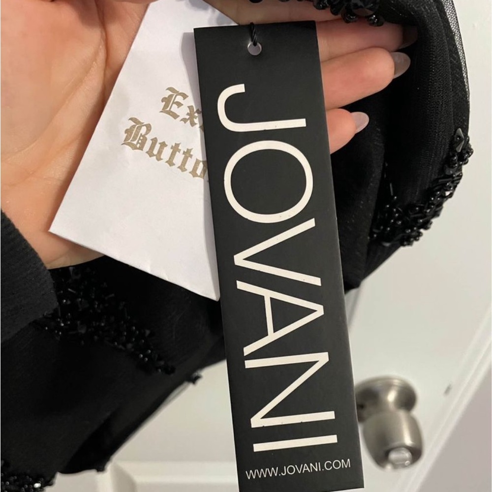 Jovani size 10 but fits for a size 6. This designer runs small
